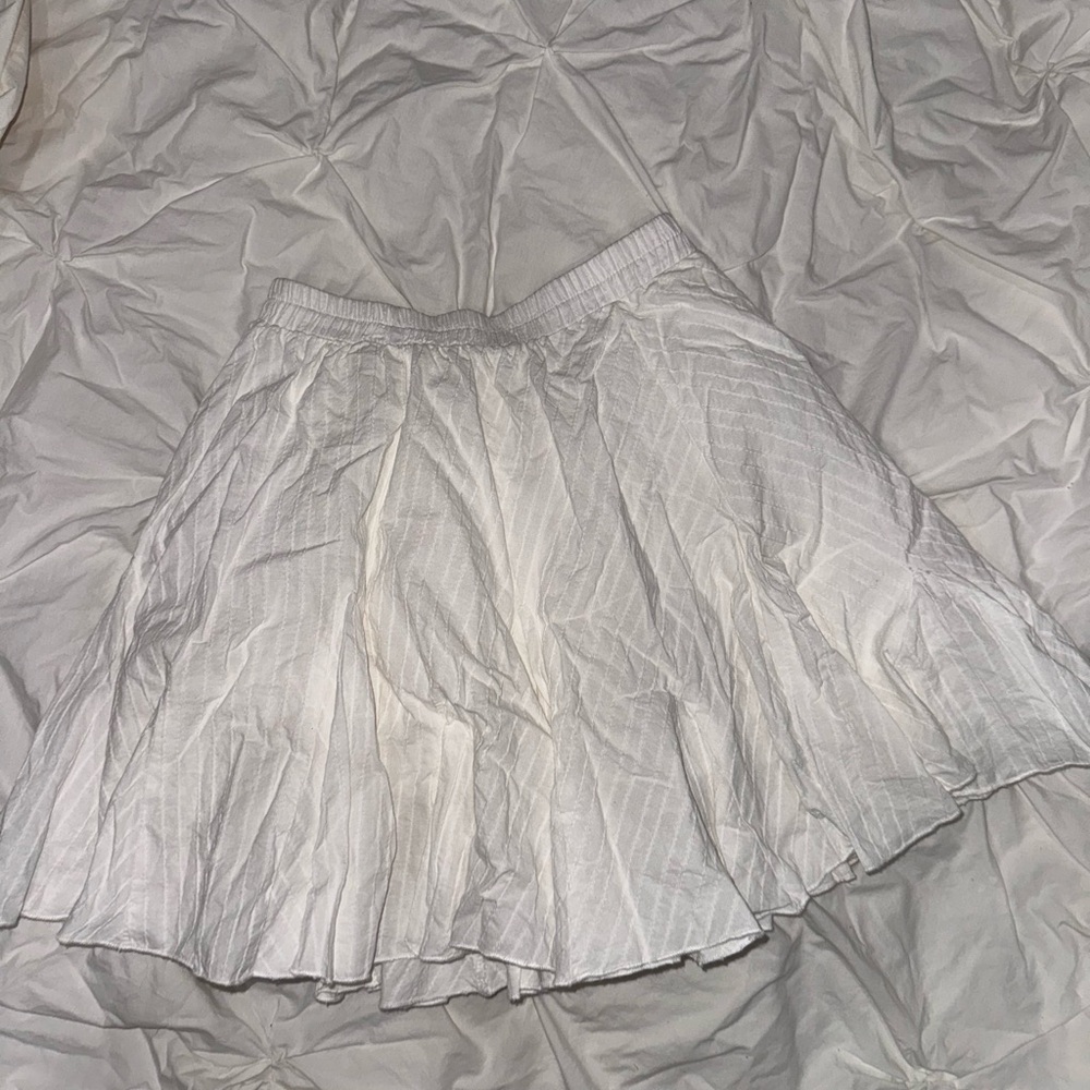 Cream A-Line Mini Skirt with Pleats for Casual Resort Wear